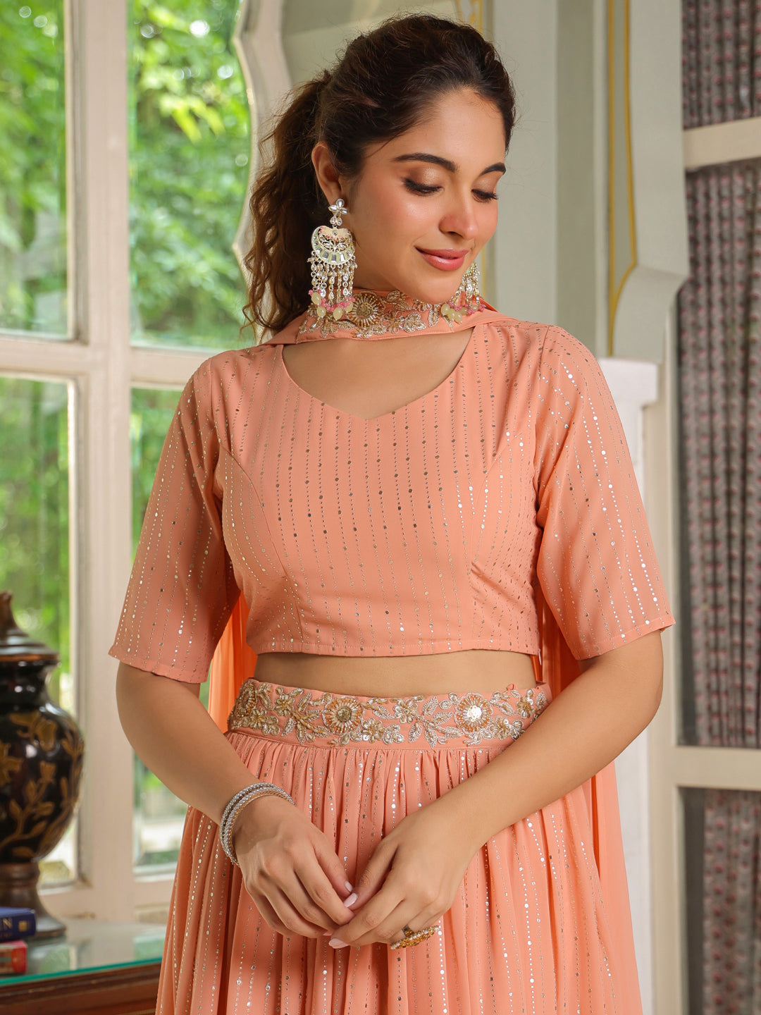 Peach Georgette Foil Printed Gathered Embellished Lehenga Choli Set