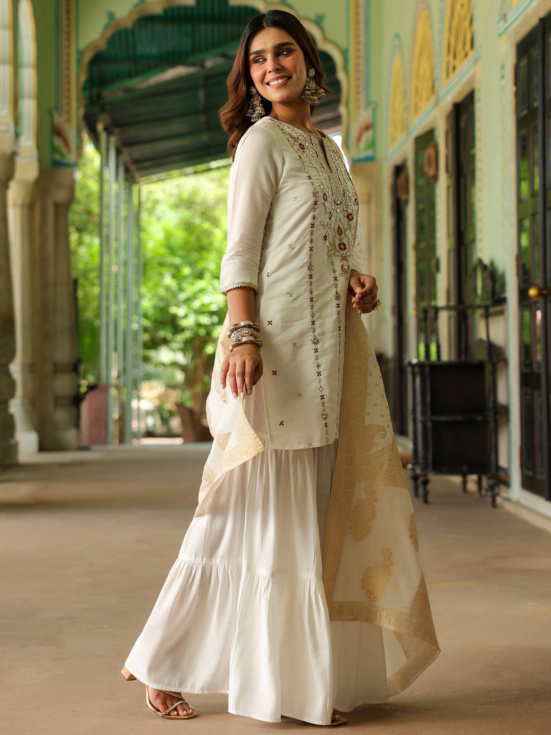 Janasya Women's Off White Chanderi Silk Embroidered Mirror Work Kurta With Sharara & Dupatta Set