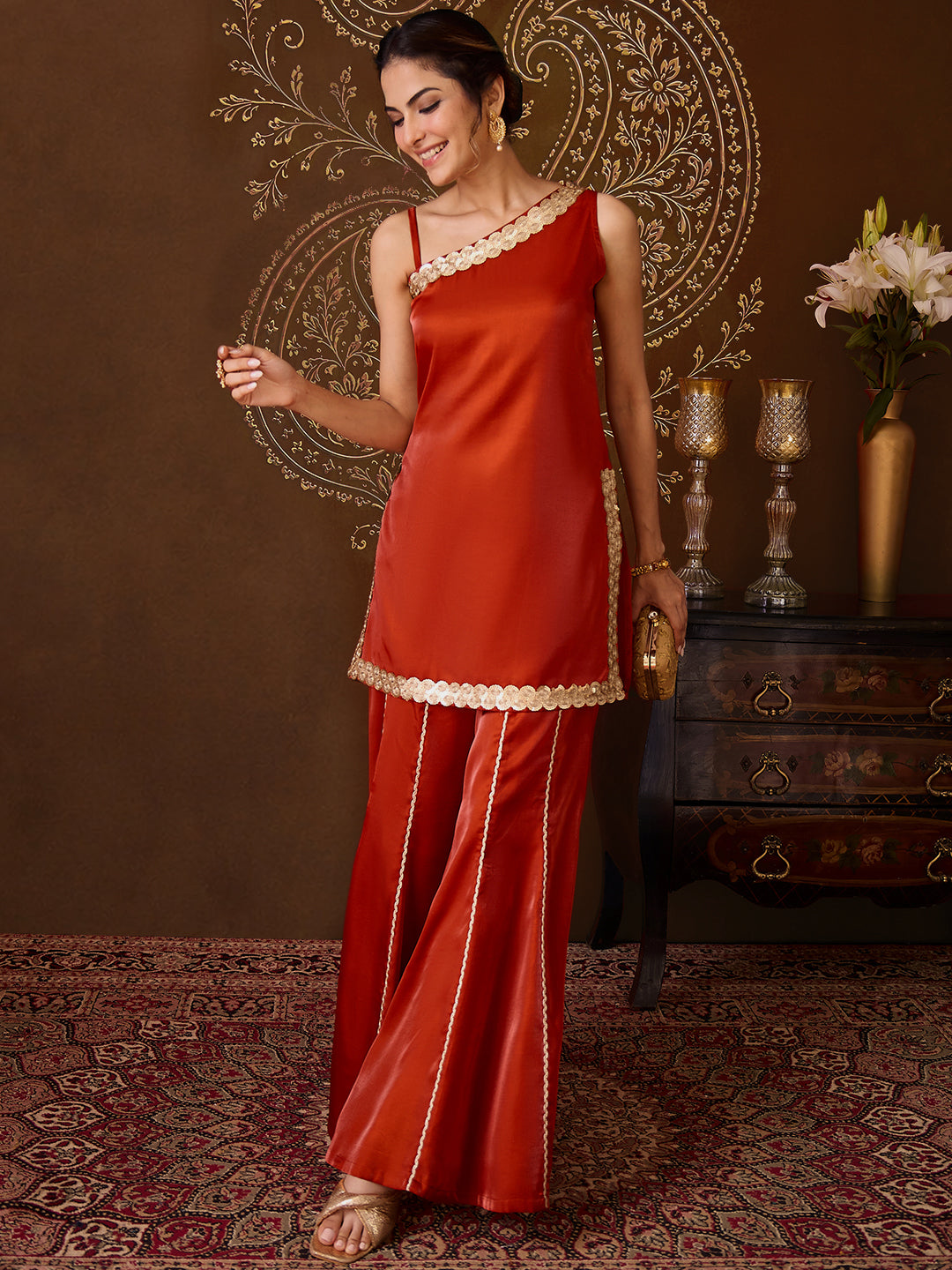 Janasya Women's Rust Silk Blend Sequins Embellished One-Shoulder Kurta with Flared Pants