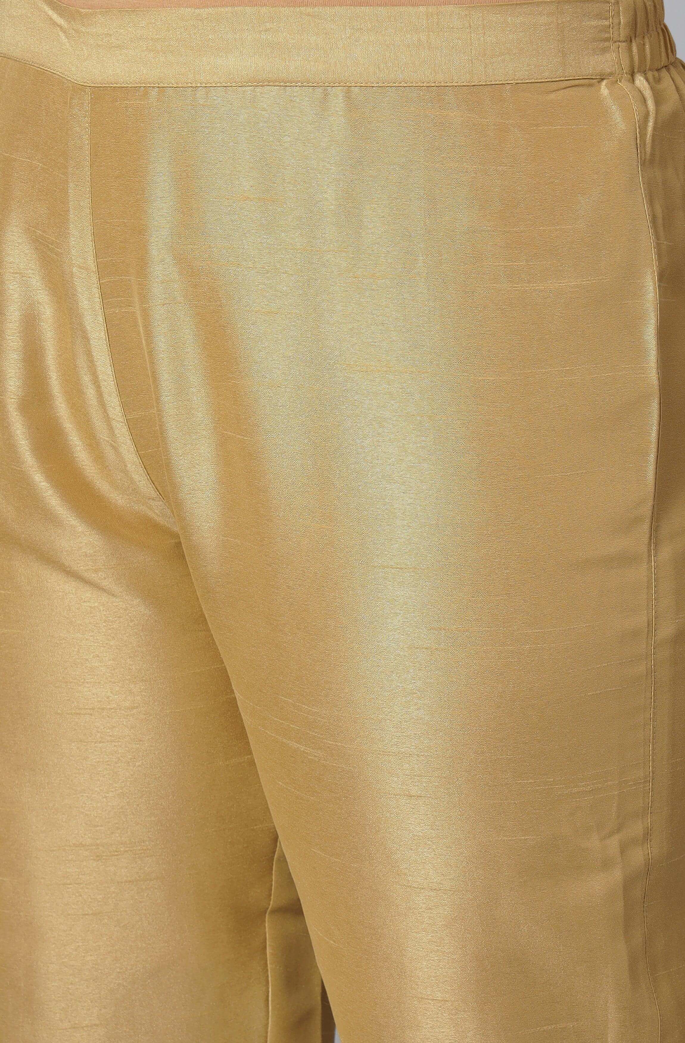 Satin gold set with open back top and fluid pants
